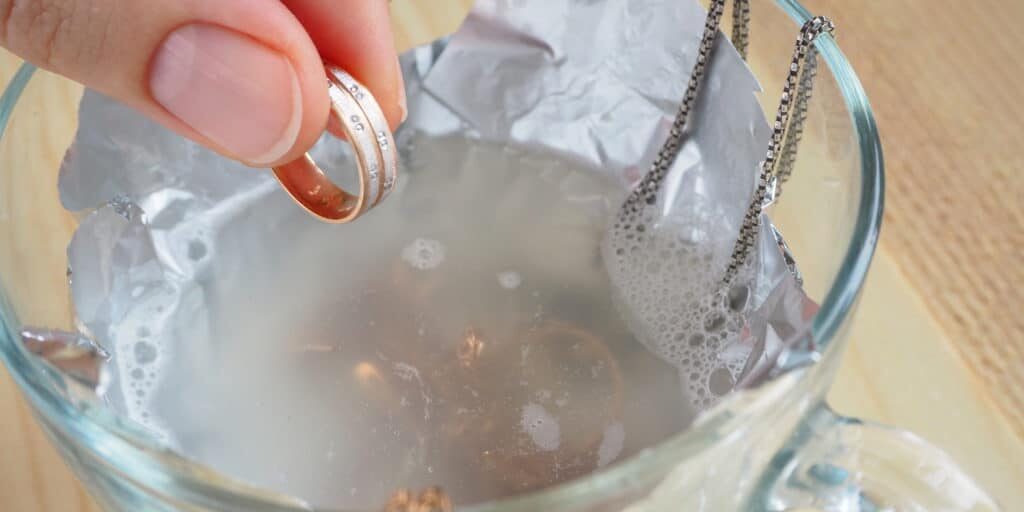 Cleaning gold and silver jewelry. Cleaning women jewelry concept.